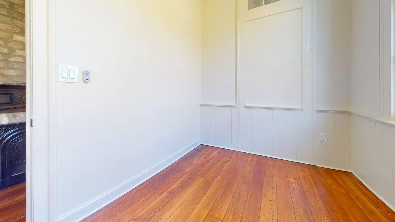 Bedroom after rehabilitation — fully restored to residential standard