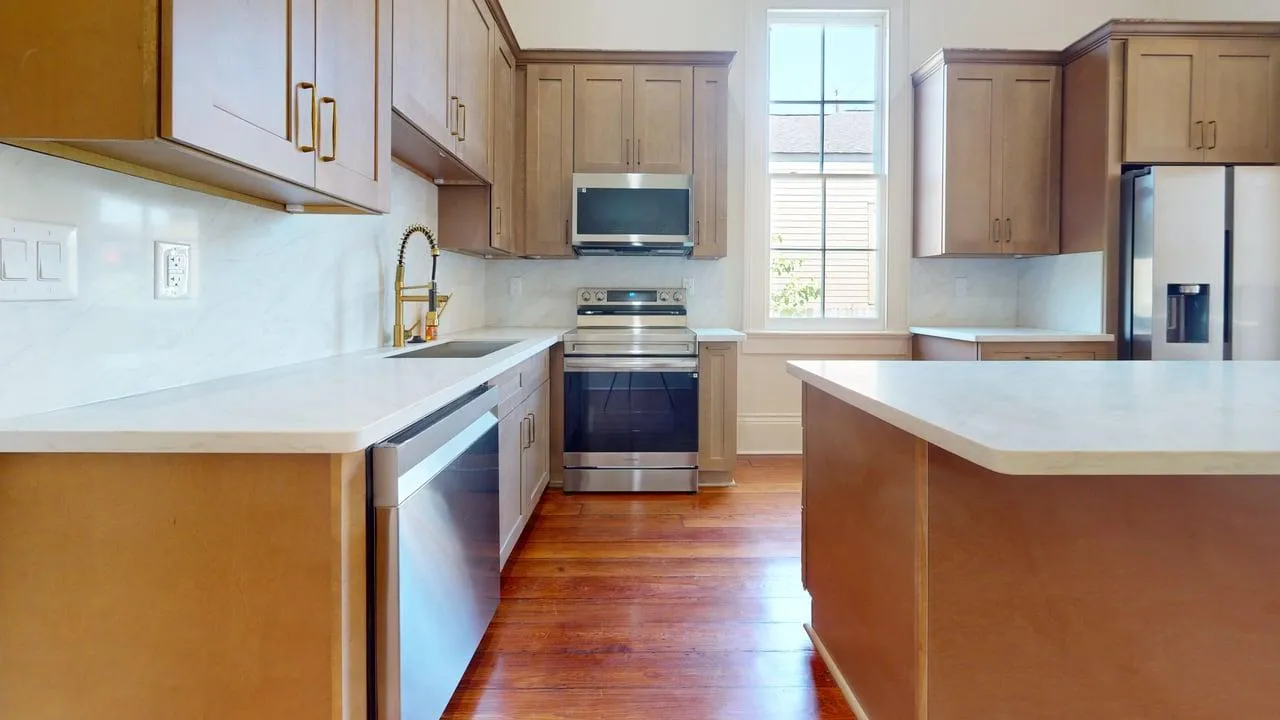 Completed kitchen — full historic rehabilitation, modern systems, restored finishes